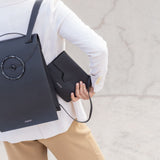 clutch-illusion-charcoal-leather-complement-backpack